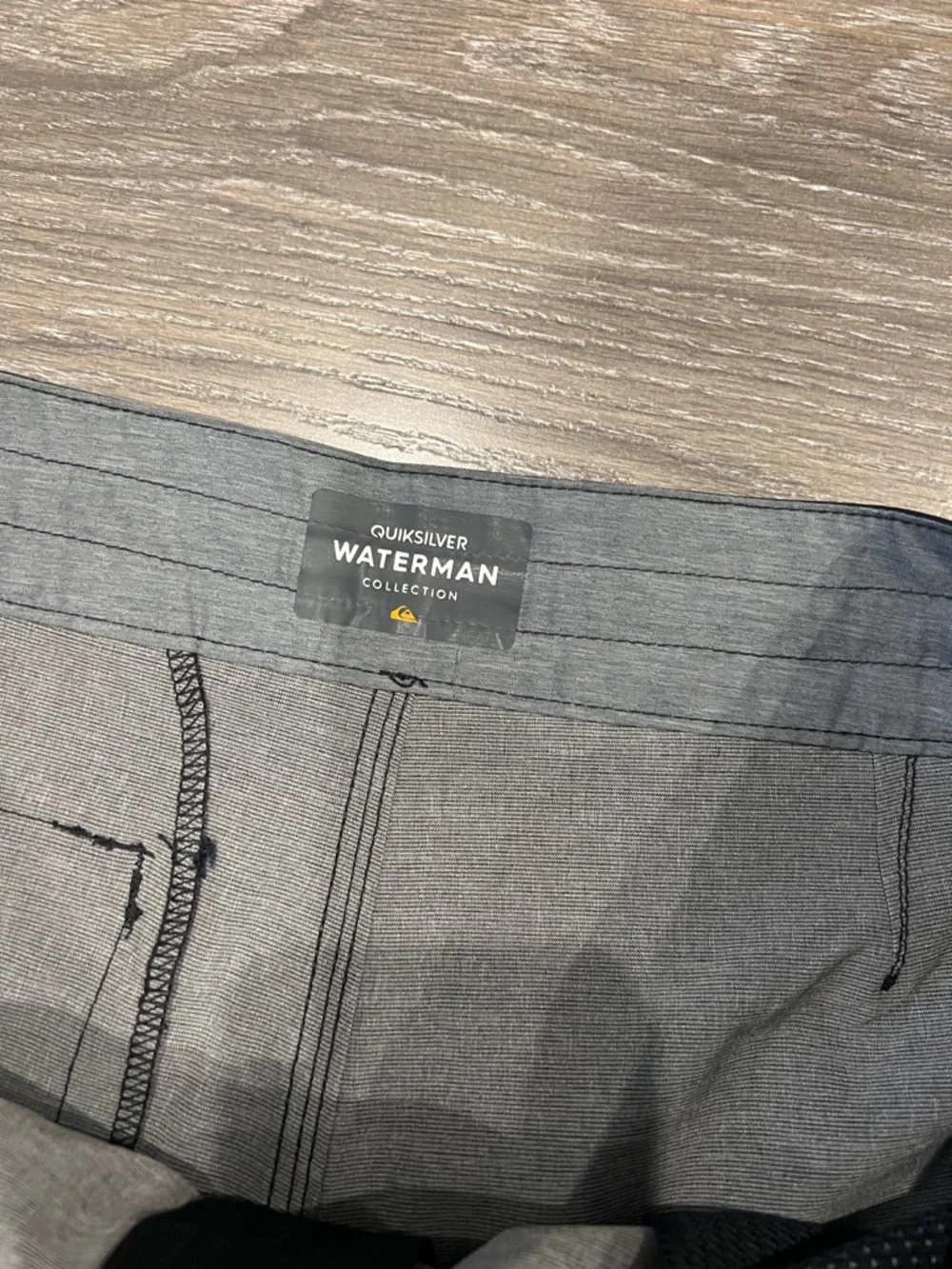 Quiksilver Watermen Collection Men’s Navy, Black and Gray Striped Boardshorts